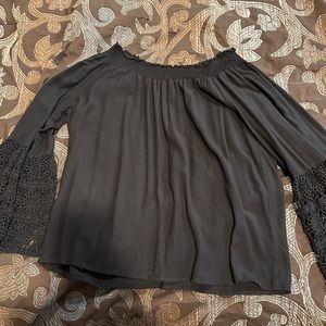Studio West black top with eyelet sleeves